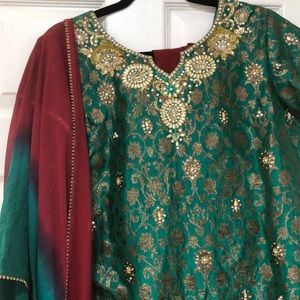 Green and maroon suit